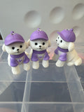 Dog with purple hat