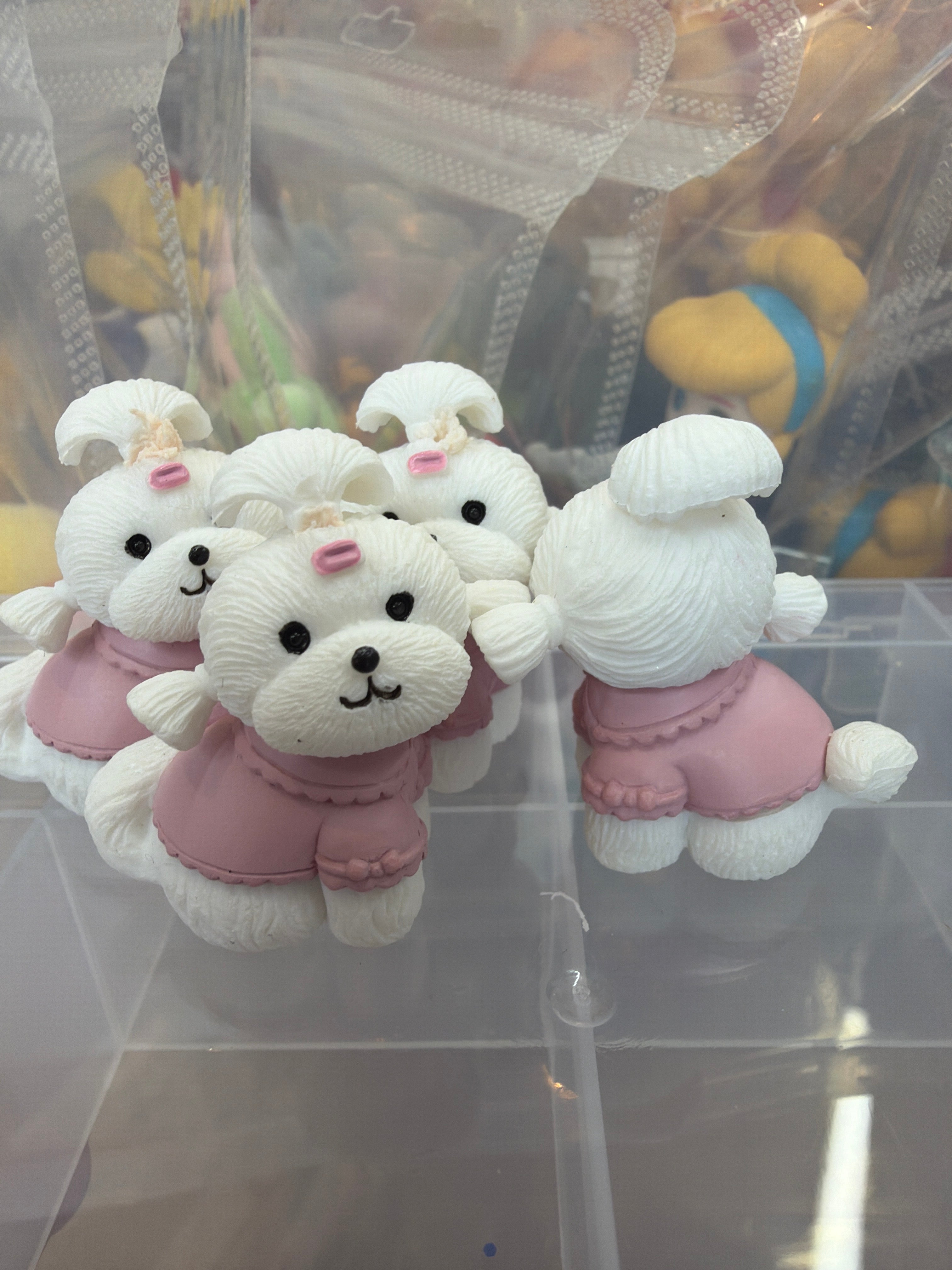 White dog pink coat